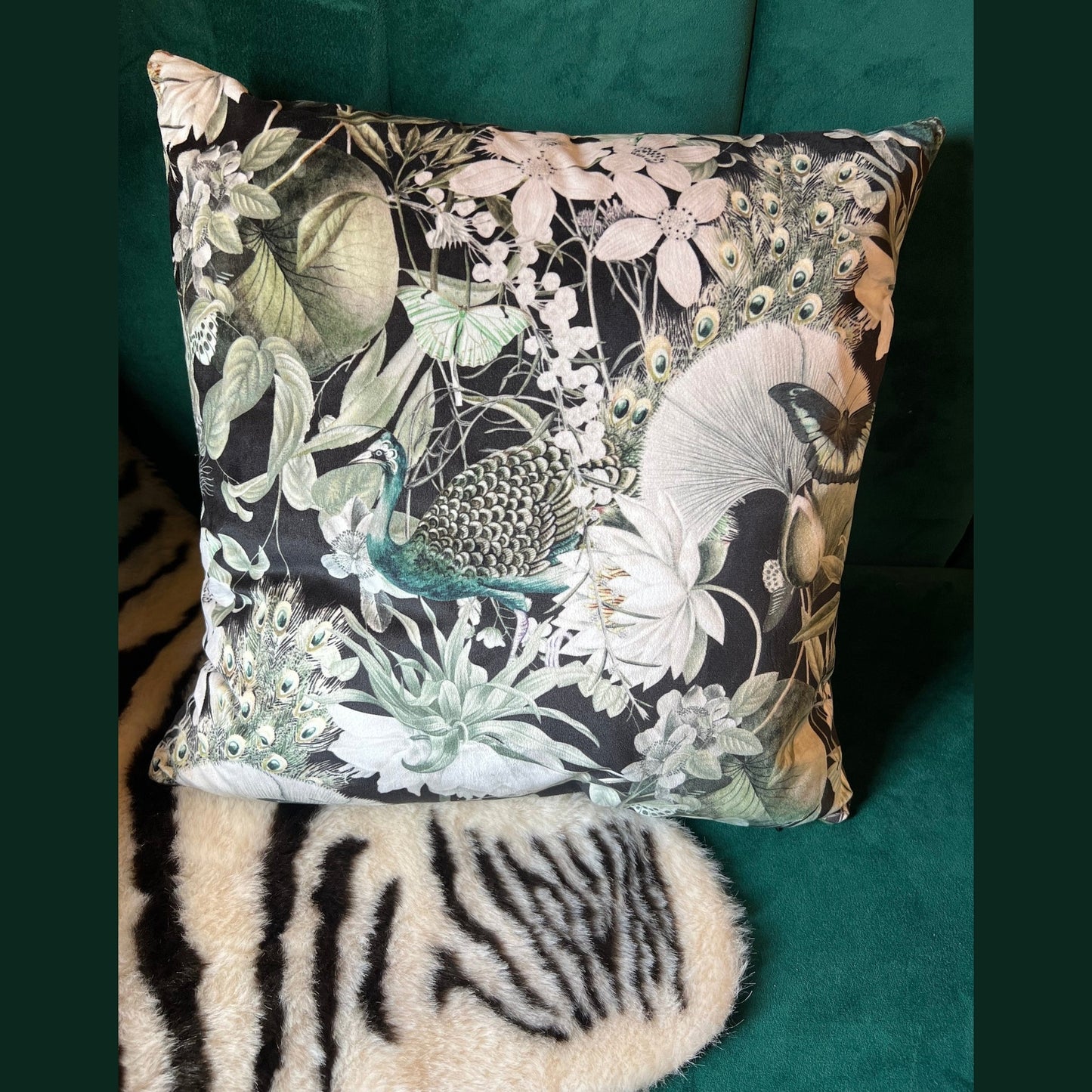 Peacocks and butterflies luxury black velvet cushion