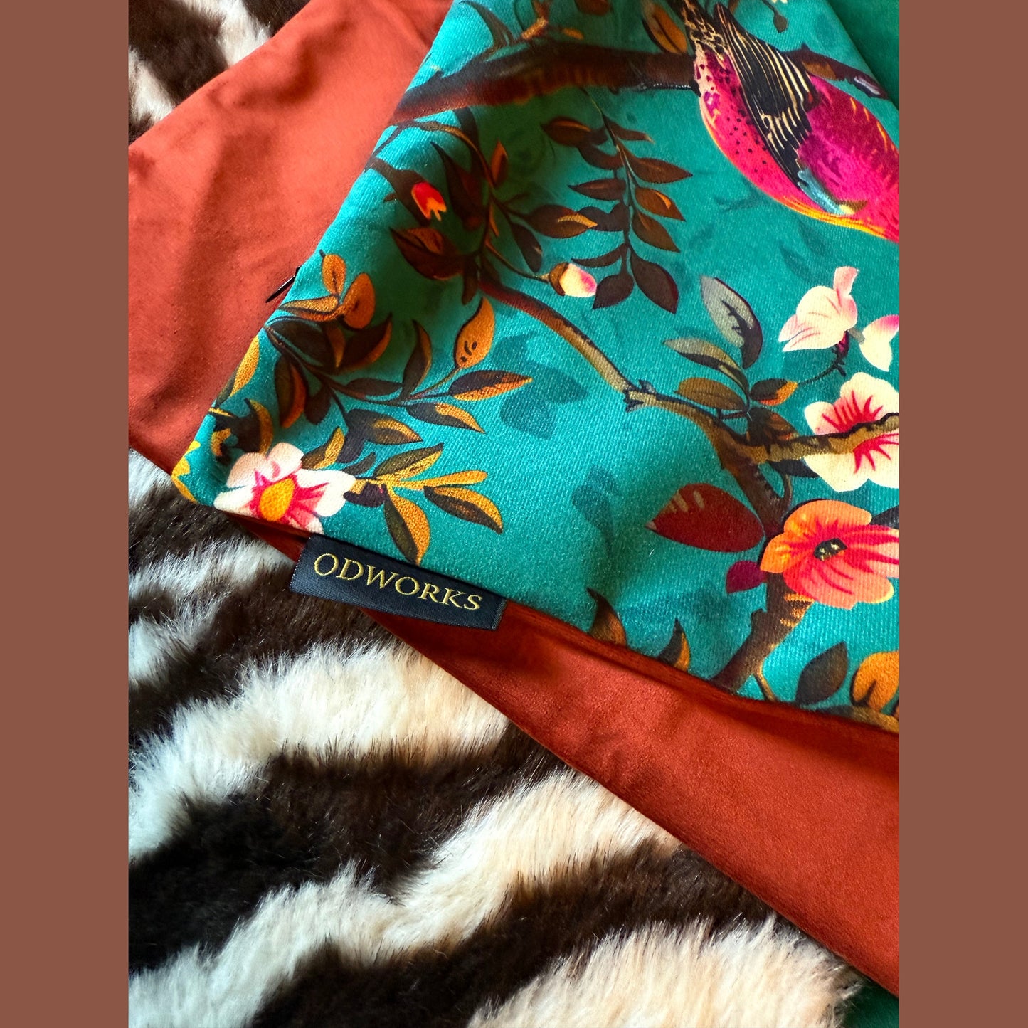 Perching birds teal velvet feather filled cushion