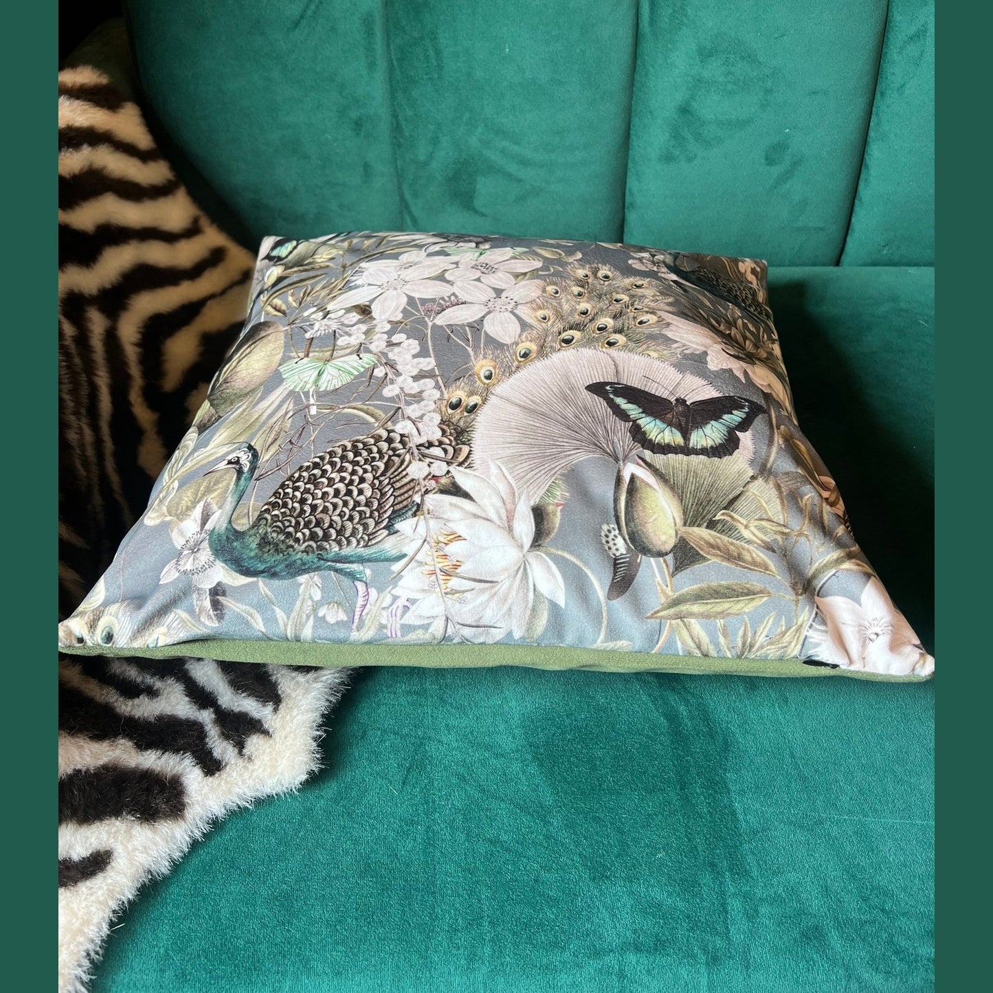 Peacocks and butterflies luxury grey velvet cushion