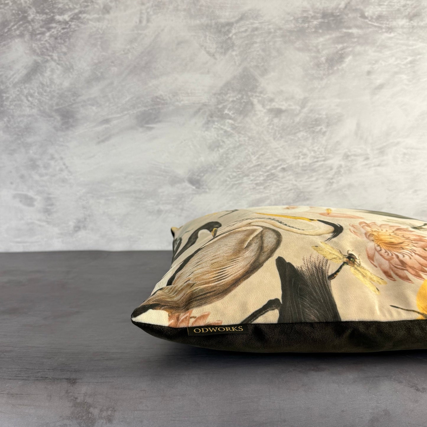 Heron and Swans cream luxury velvet feather filled cushion