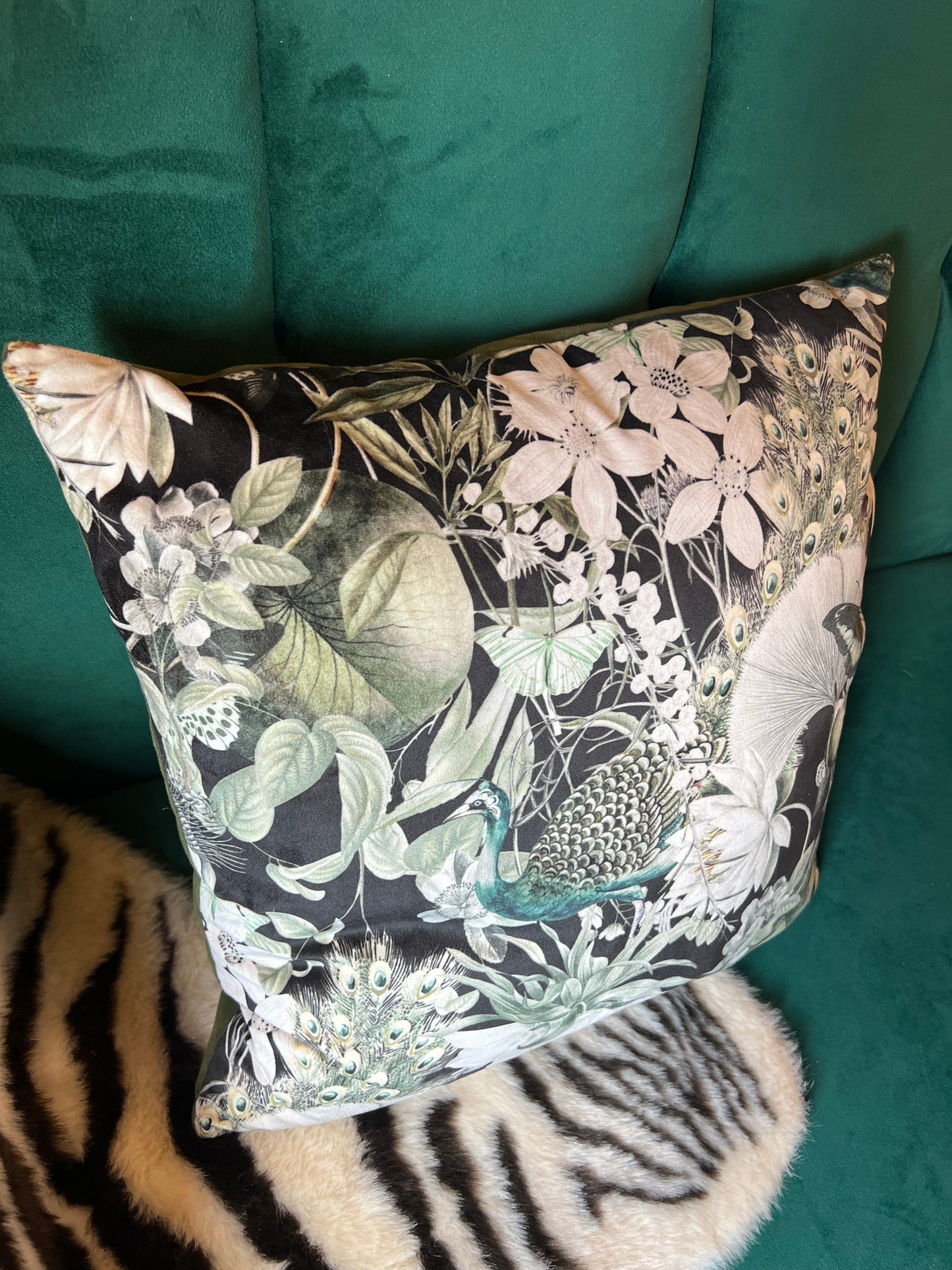 Peacocks and butterflies luxury black velvet cushion