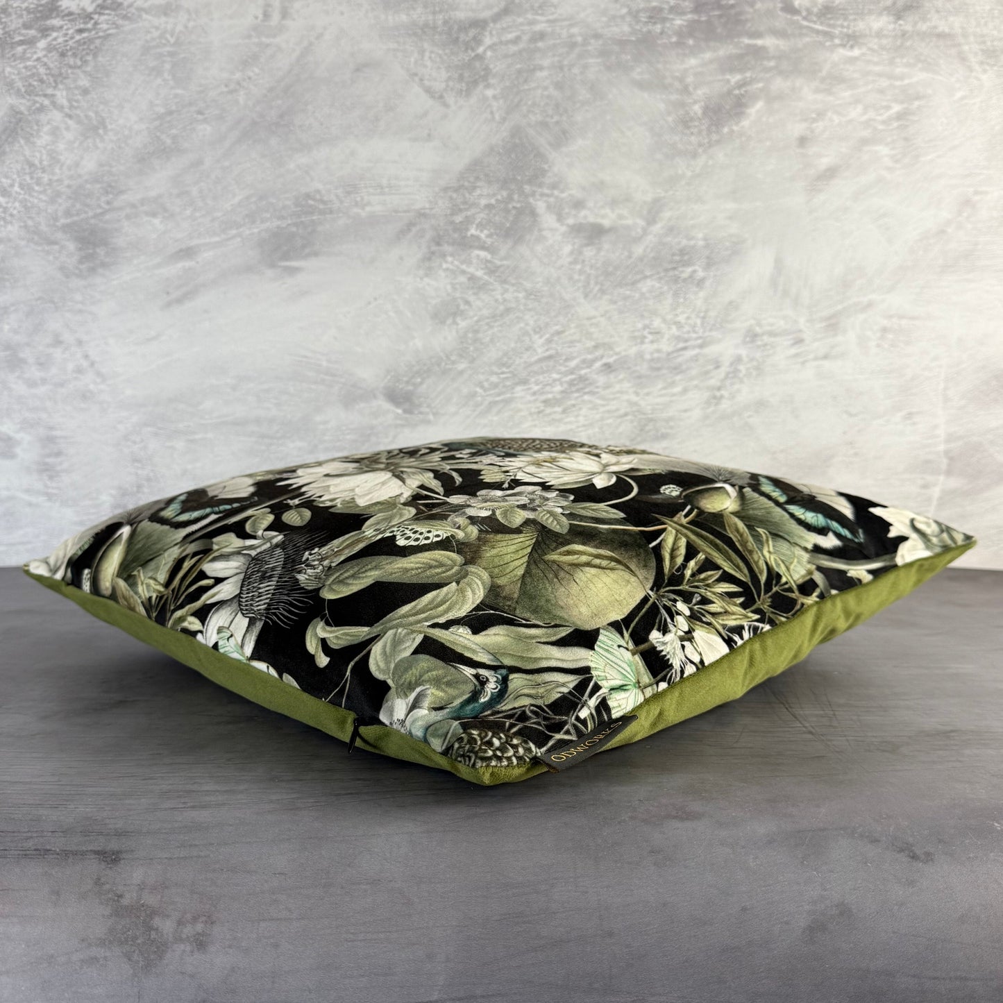 Peacocks and butterflies luxury black velvet cushion