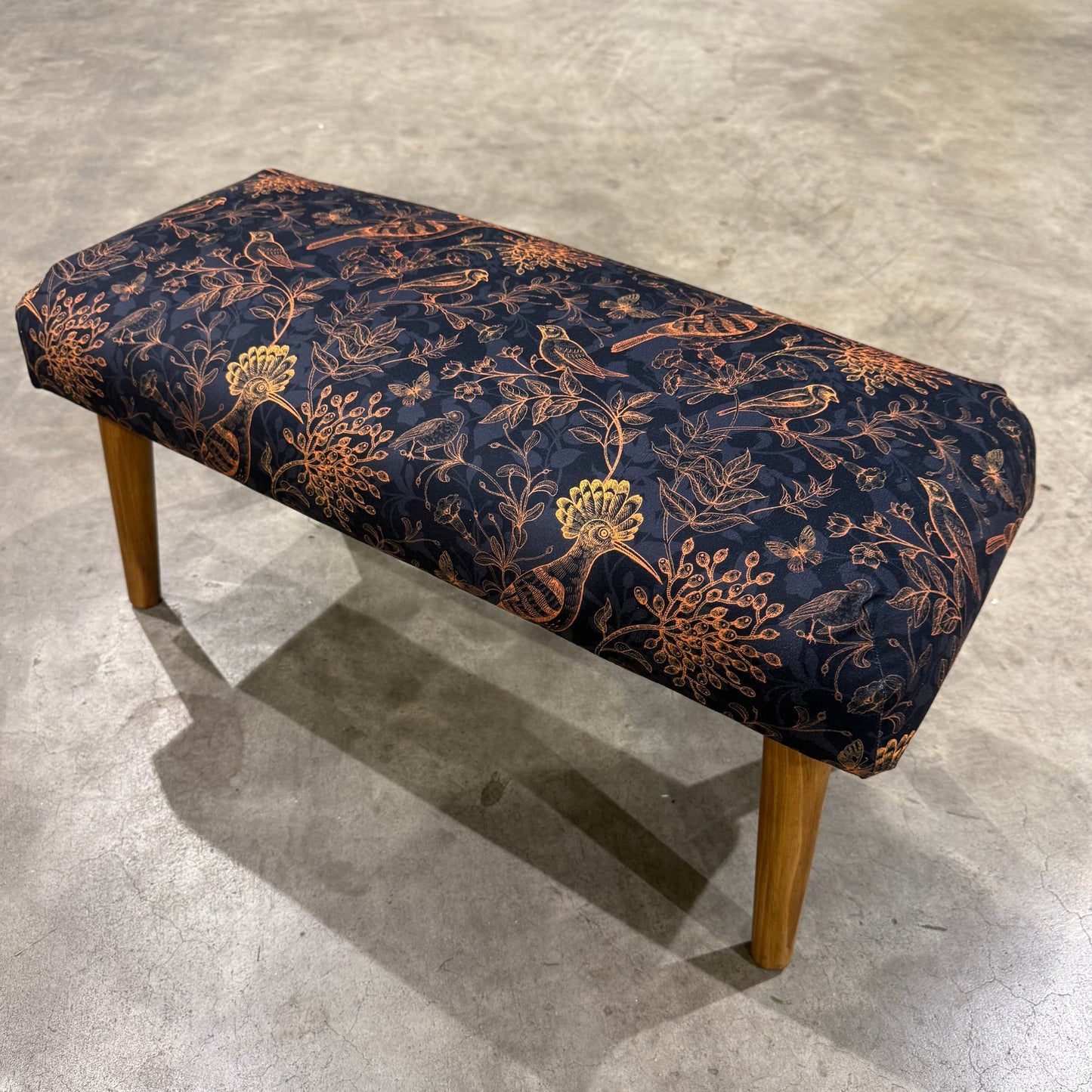 The rustic birds black and gold velvet footstool