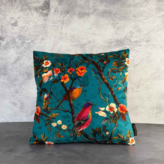 Perching birds teal velvet luxury feather filled cushion