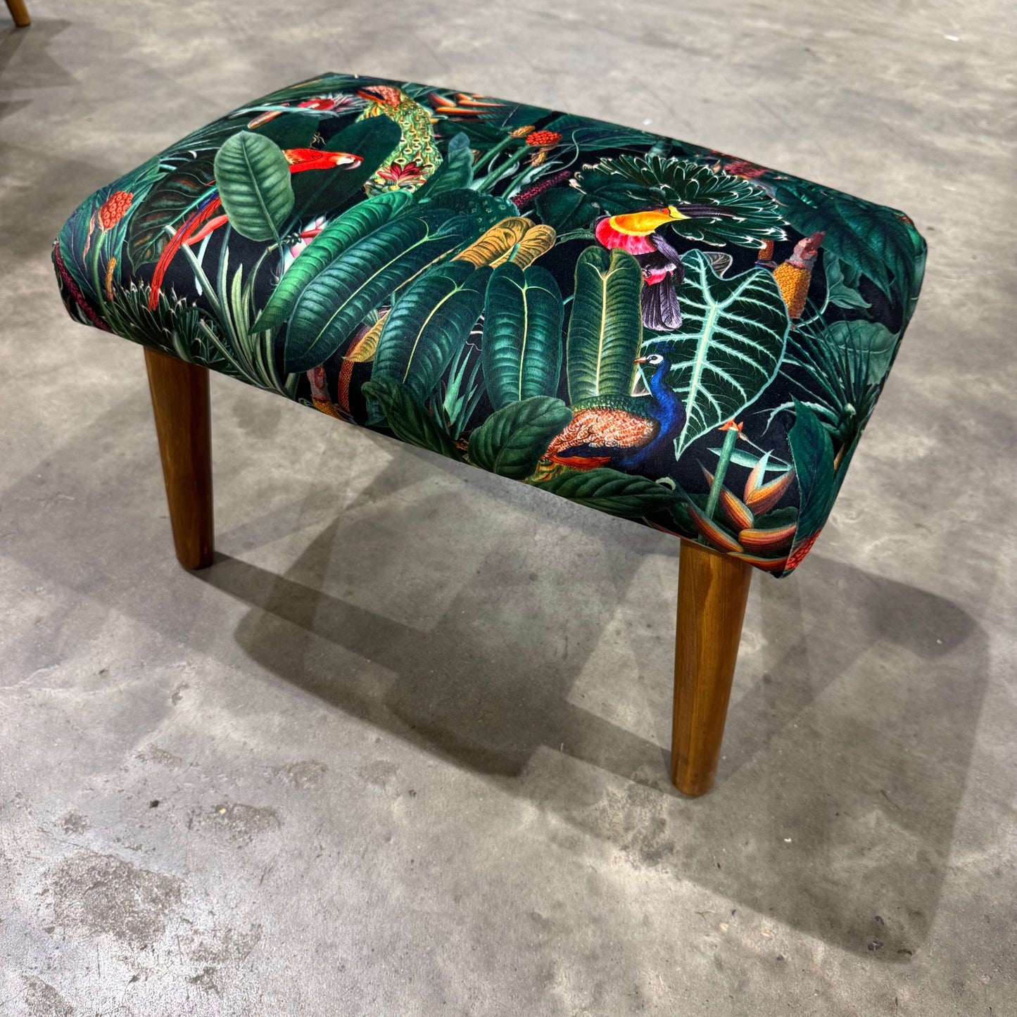 The Rainforest footstool in black velvet