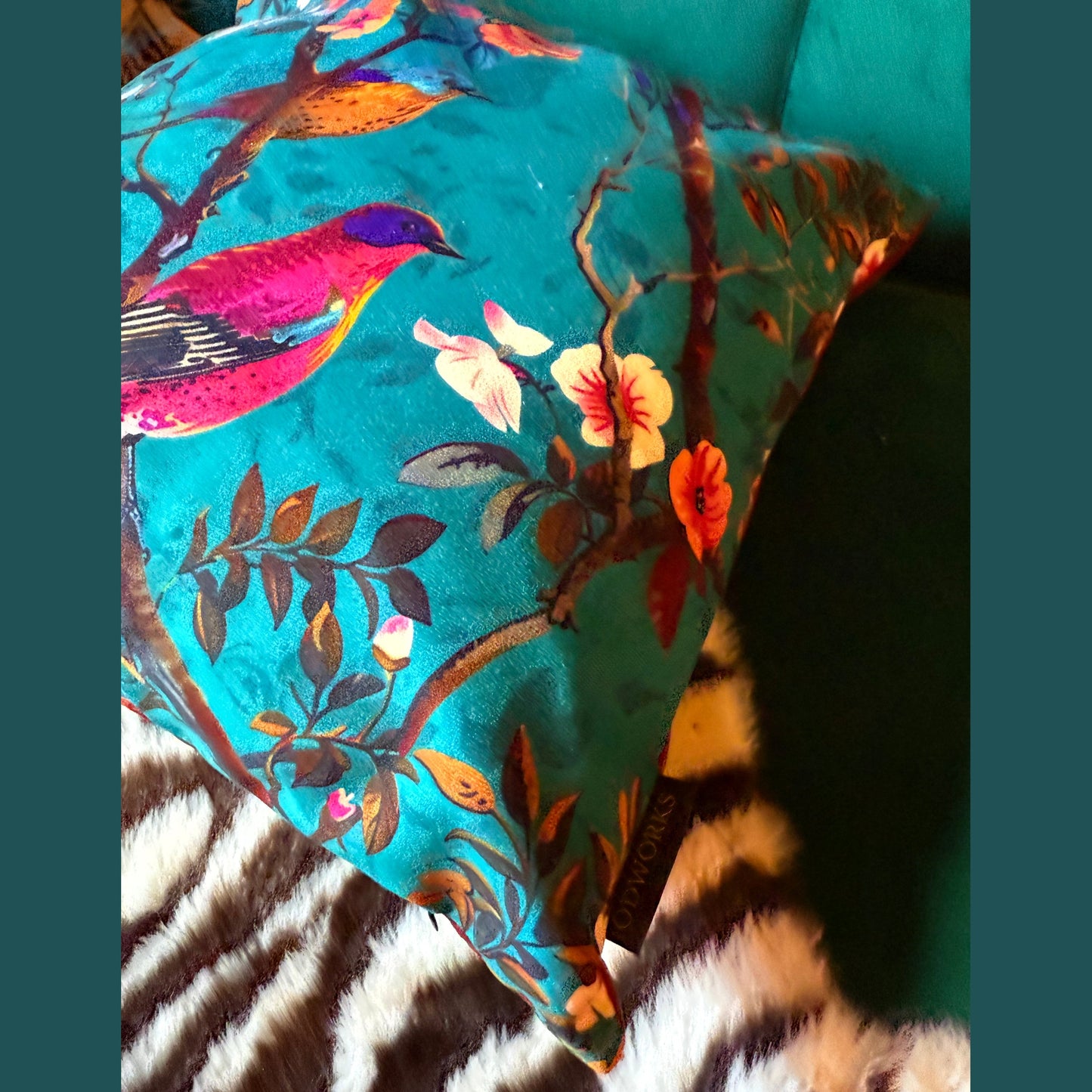 Perching birds teal velvet feather filled cushion