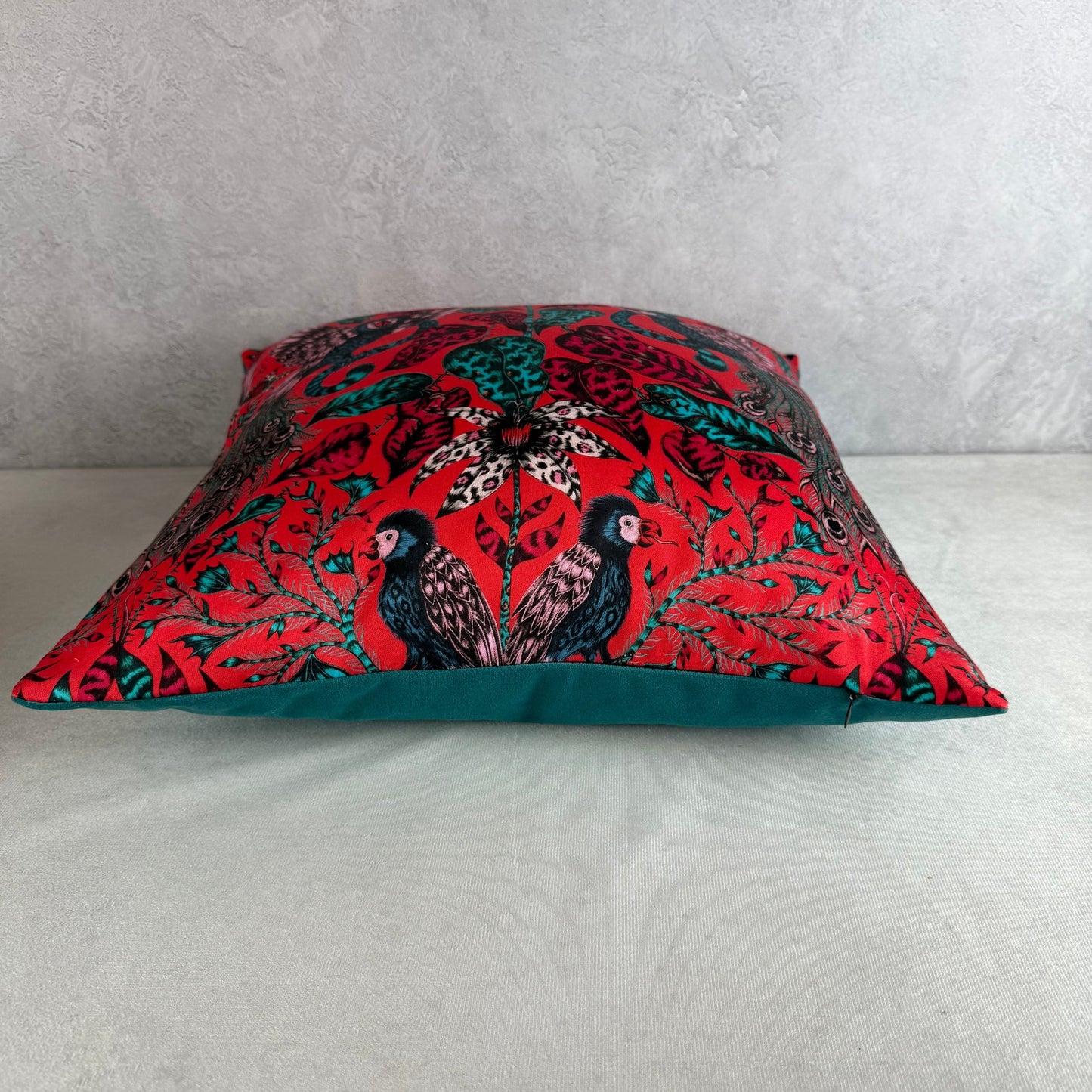 Emma J Shipley Amazon red & teal cushion
