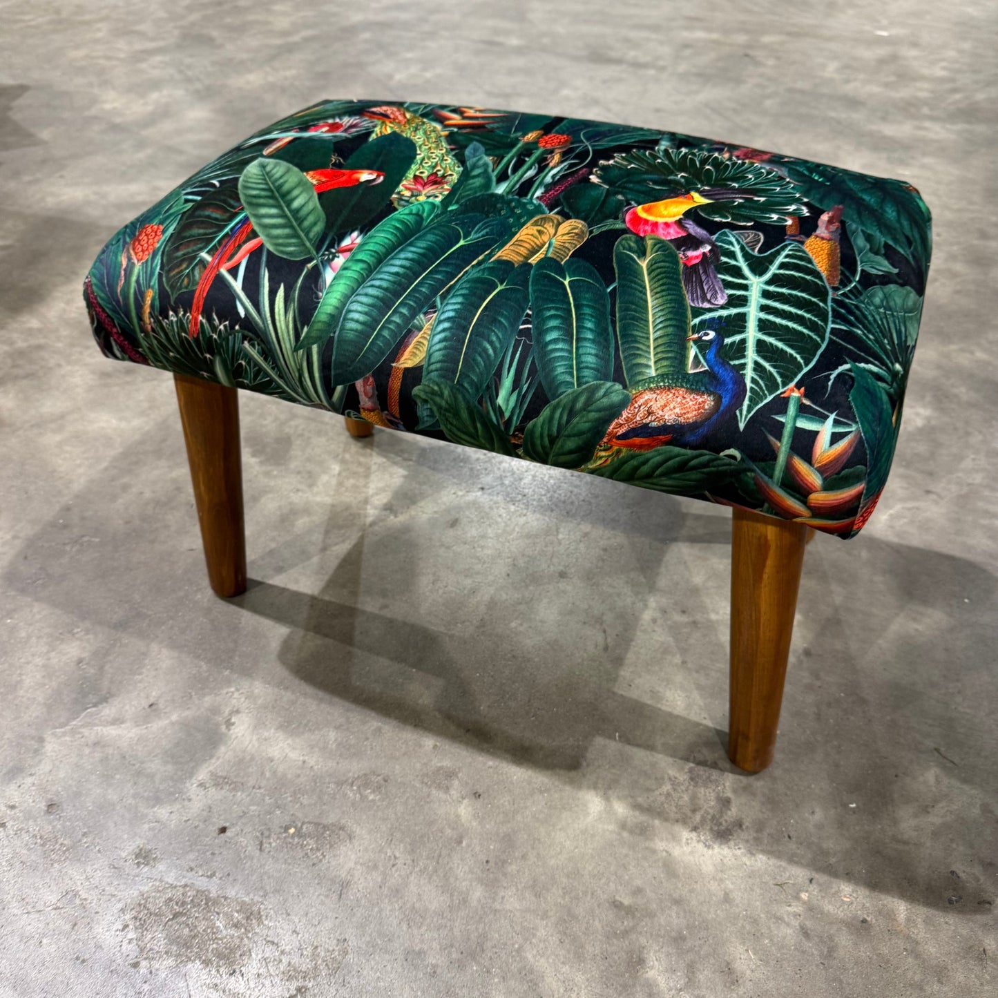 The Rainforest footstool in black velvet