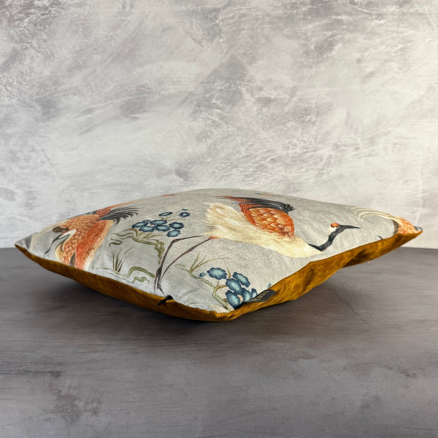 Mamoritai crane luxury velvet cushion in grey and copper