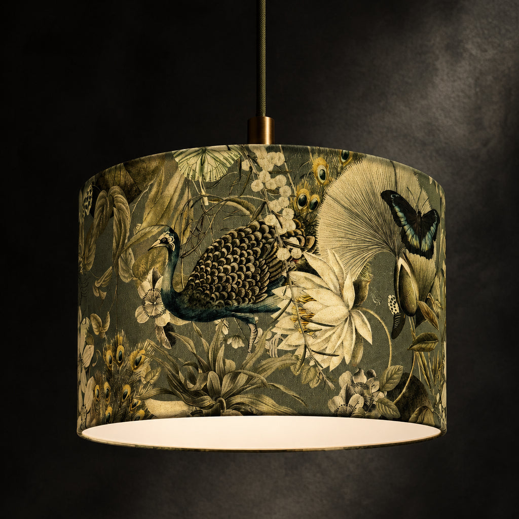 Lamp with a decorative shade featuring floral and butterfly design against a wooden paneled background.