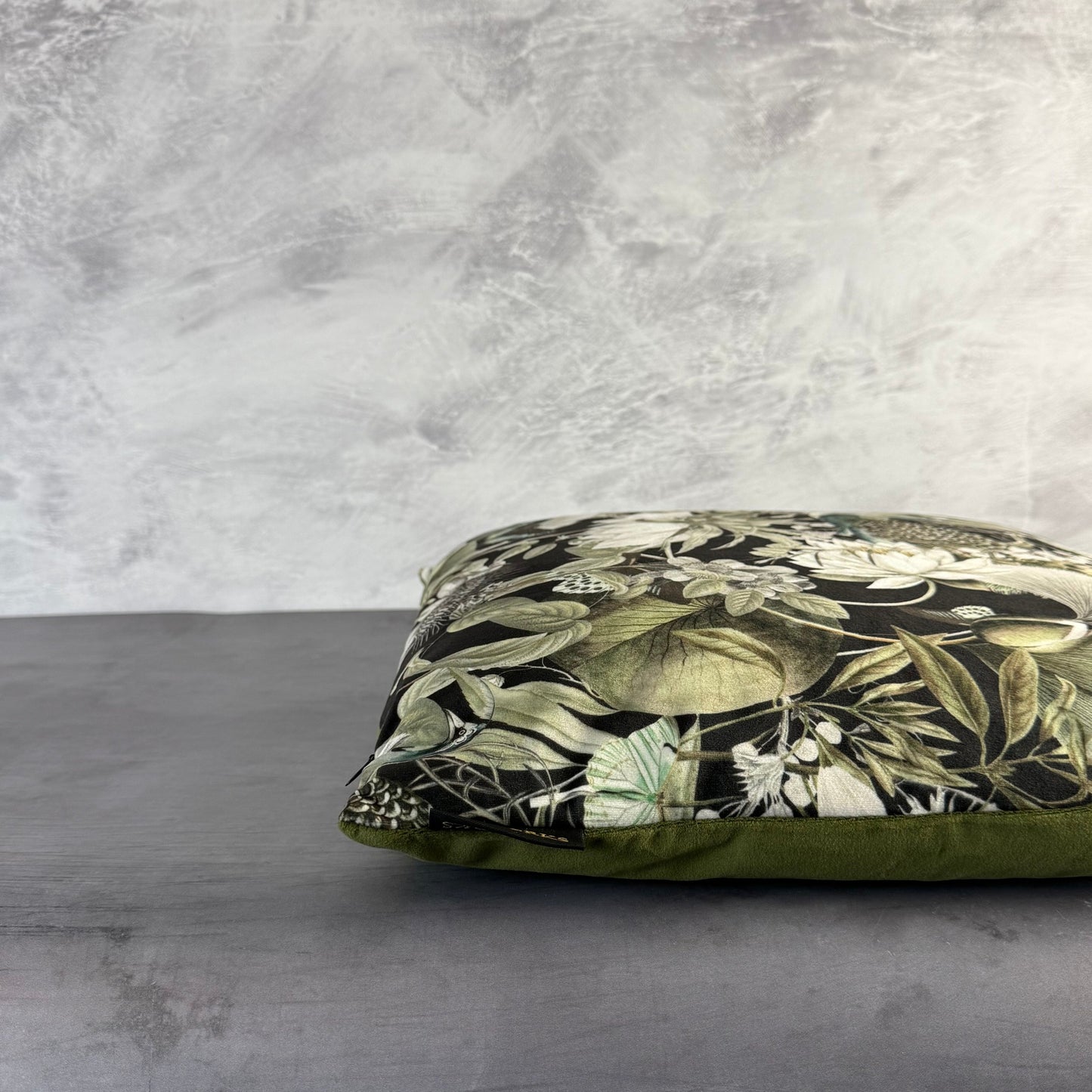 Peacocks and butterflies luxury black velvet cushion